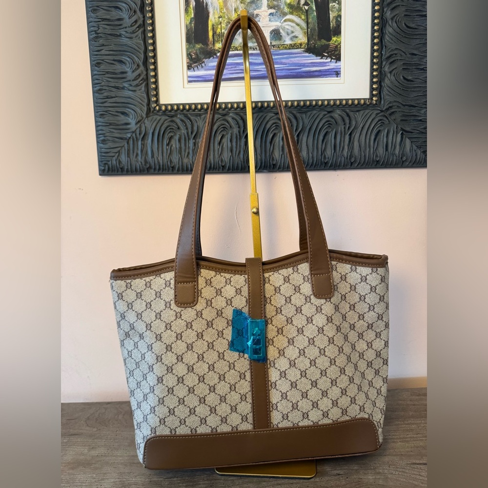 Brown and Cream Patterned Tote Bag. 10” x 12.5 x 5”. Handle drop 11”. NWOT